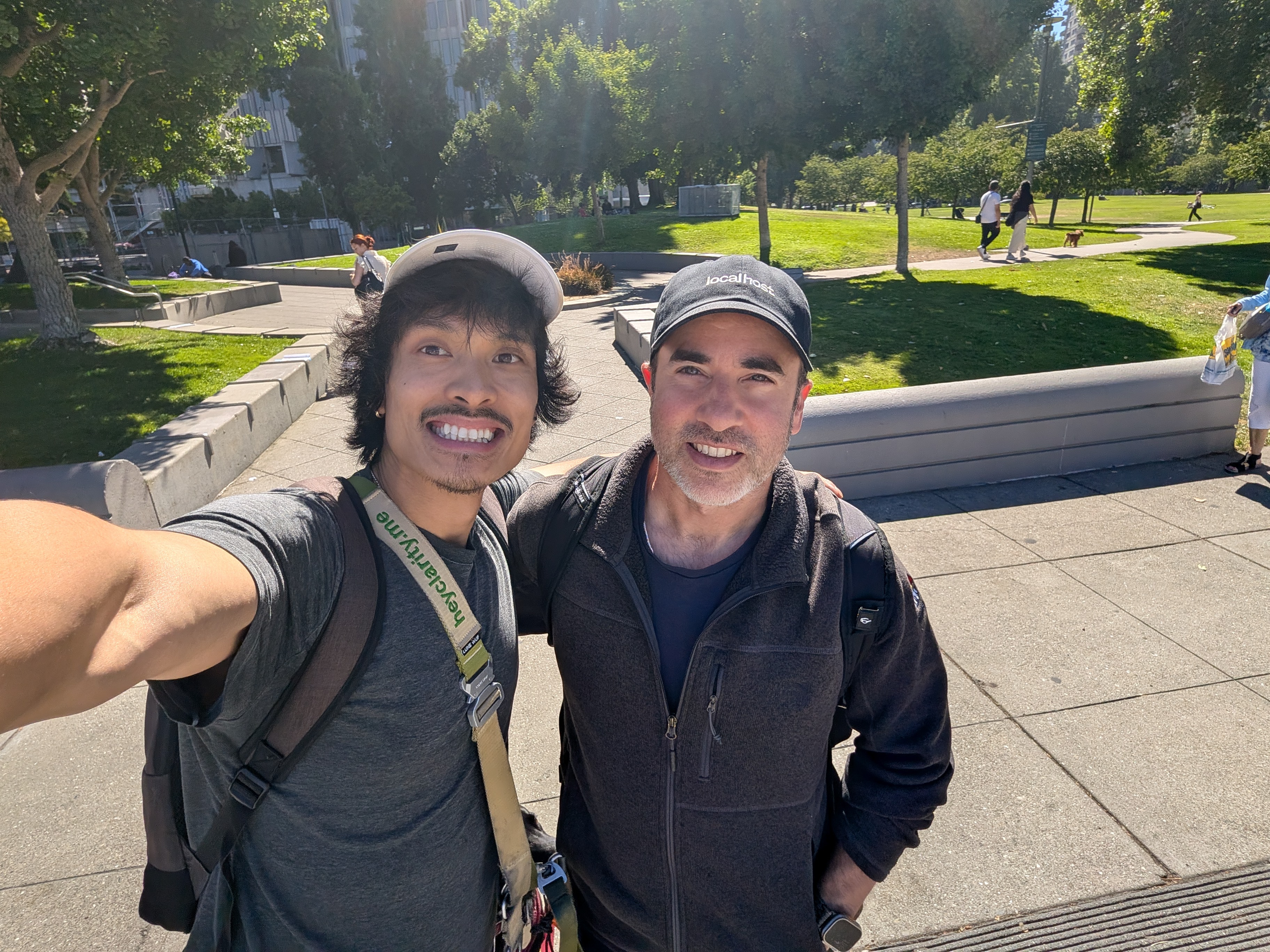 Robert and Jonathan on a sunny walk through a San Francisco park