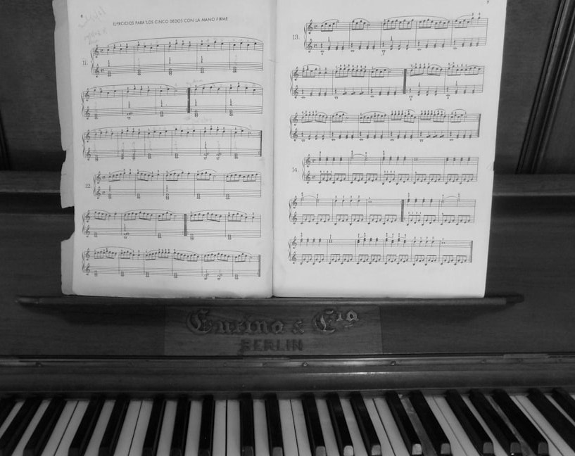 gray wooden upright piano