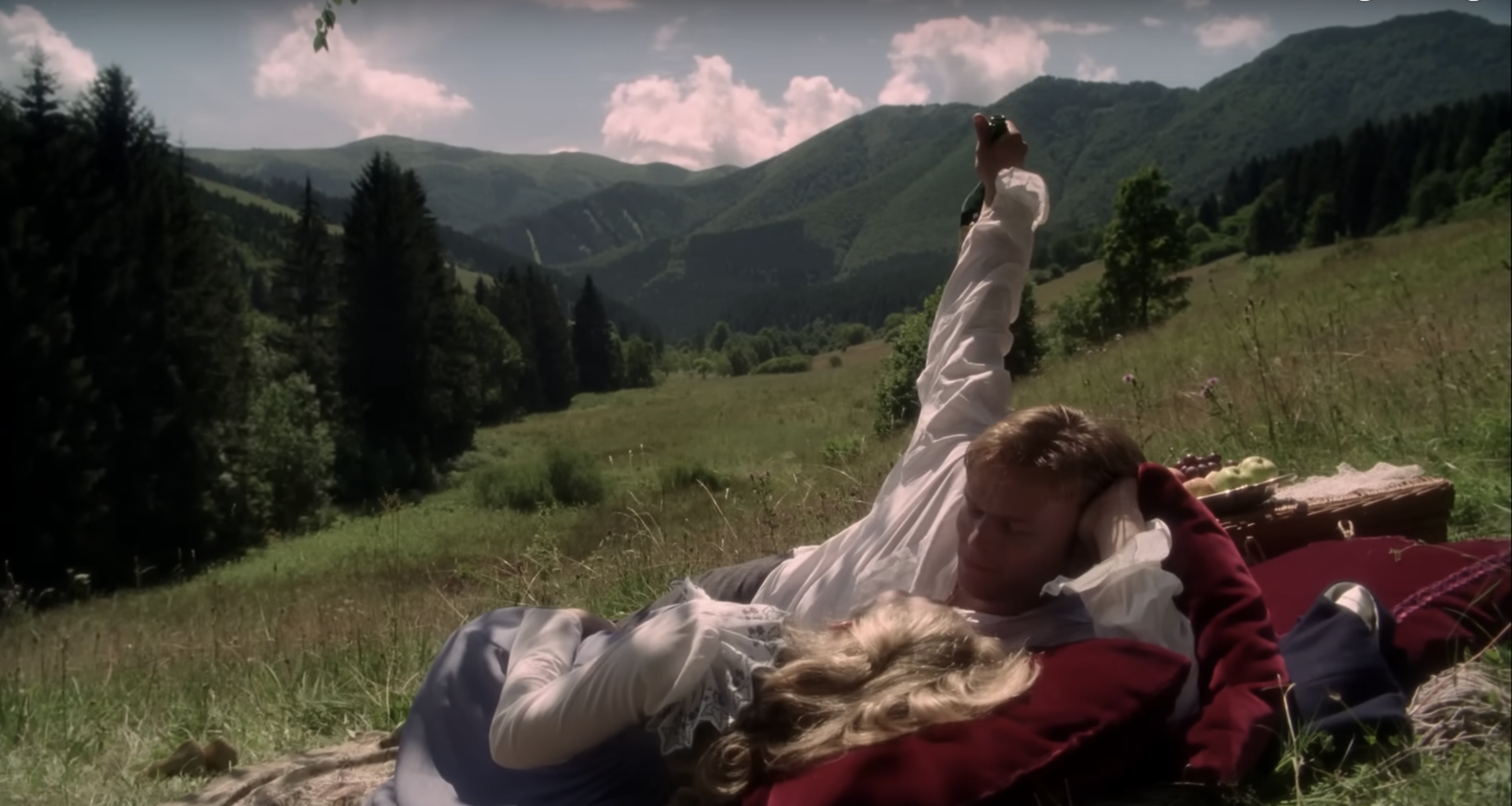 A screenshot showing Victor and Elizabeth having a romantic picnic.