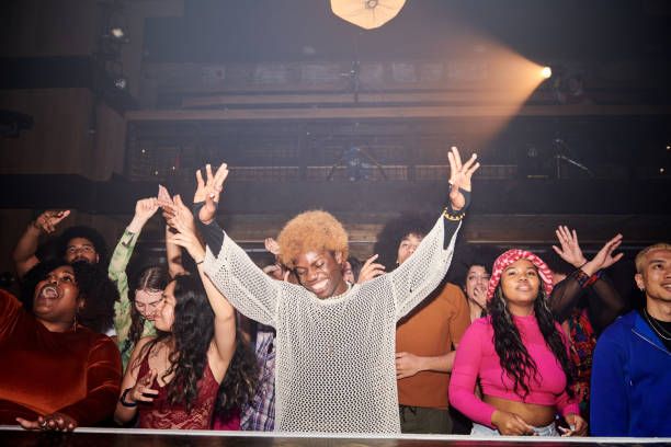 Group of people dancing at a music venue