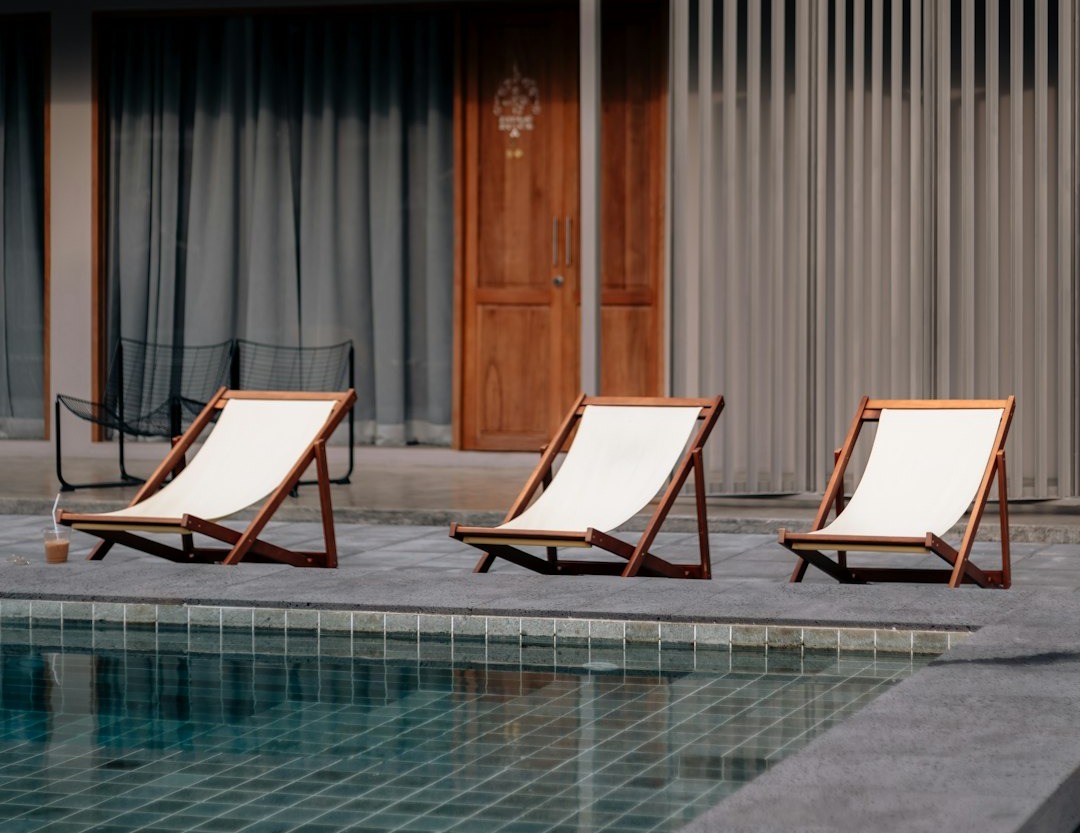 three pool chairs