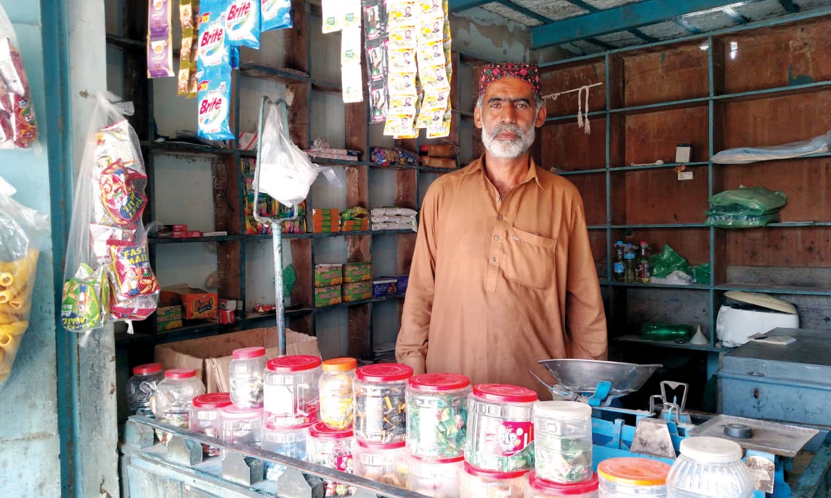 Abdul Karim Mangrio at his shop in Umerkot