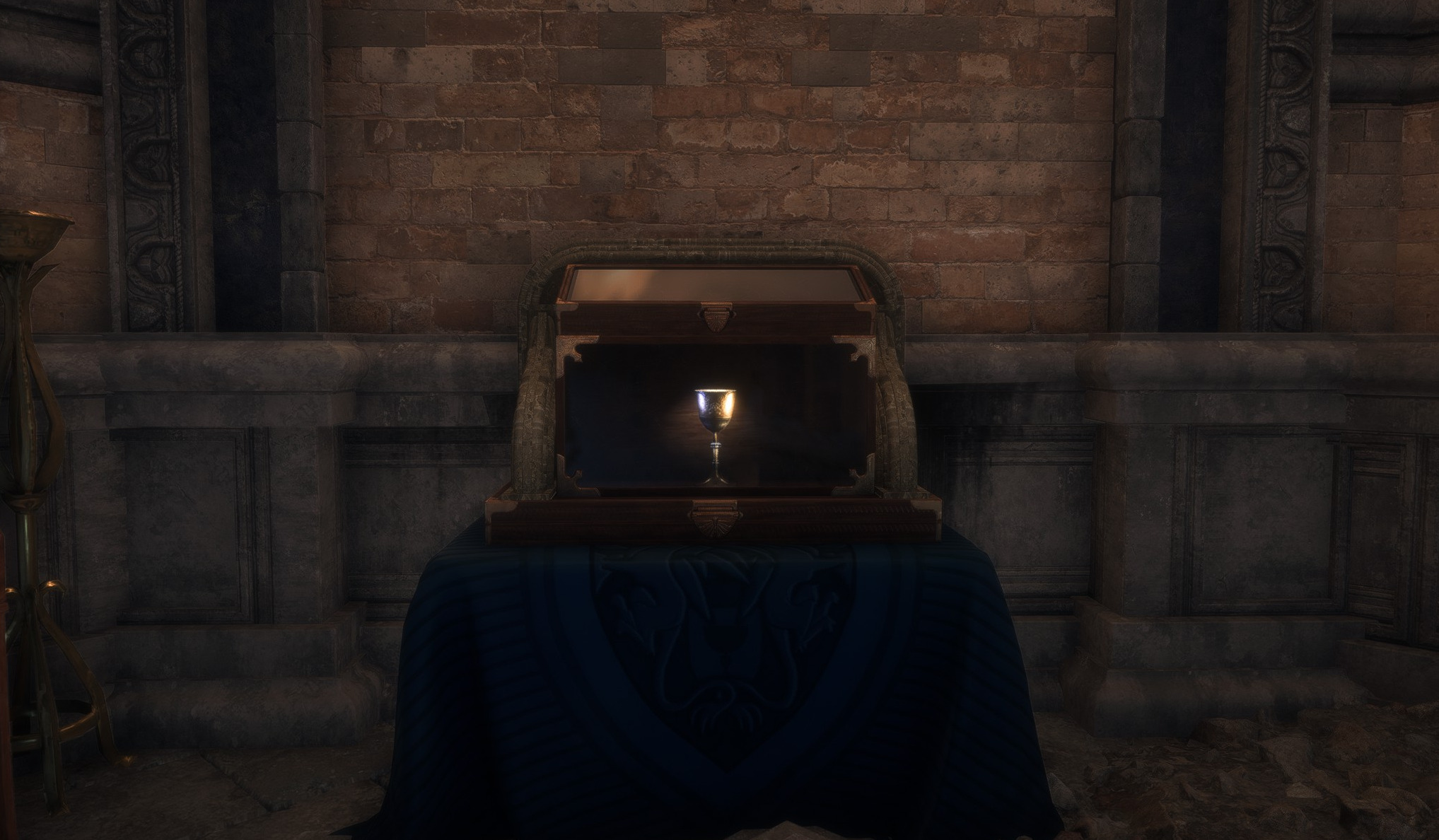 A screenshot from Dragon Age: The Veilguard of the Joining Chalice in a display case.