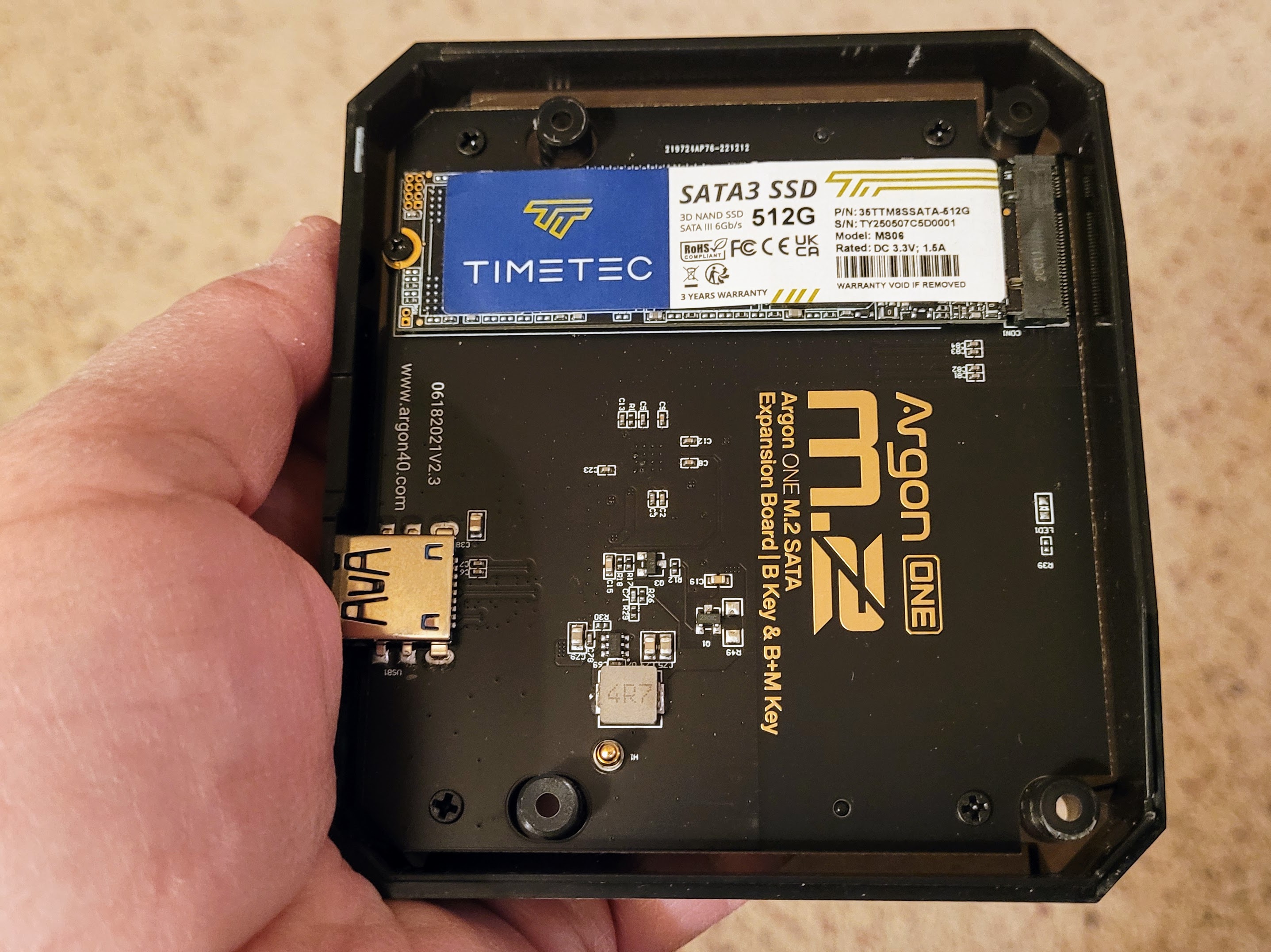 The SSD is mounted and secured in the Argon ONE M.2 base