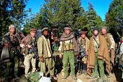 A group of men in military uniforms

AI-generated content may be incorrect.