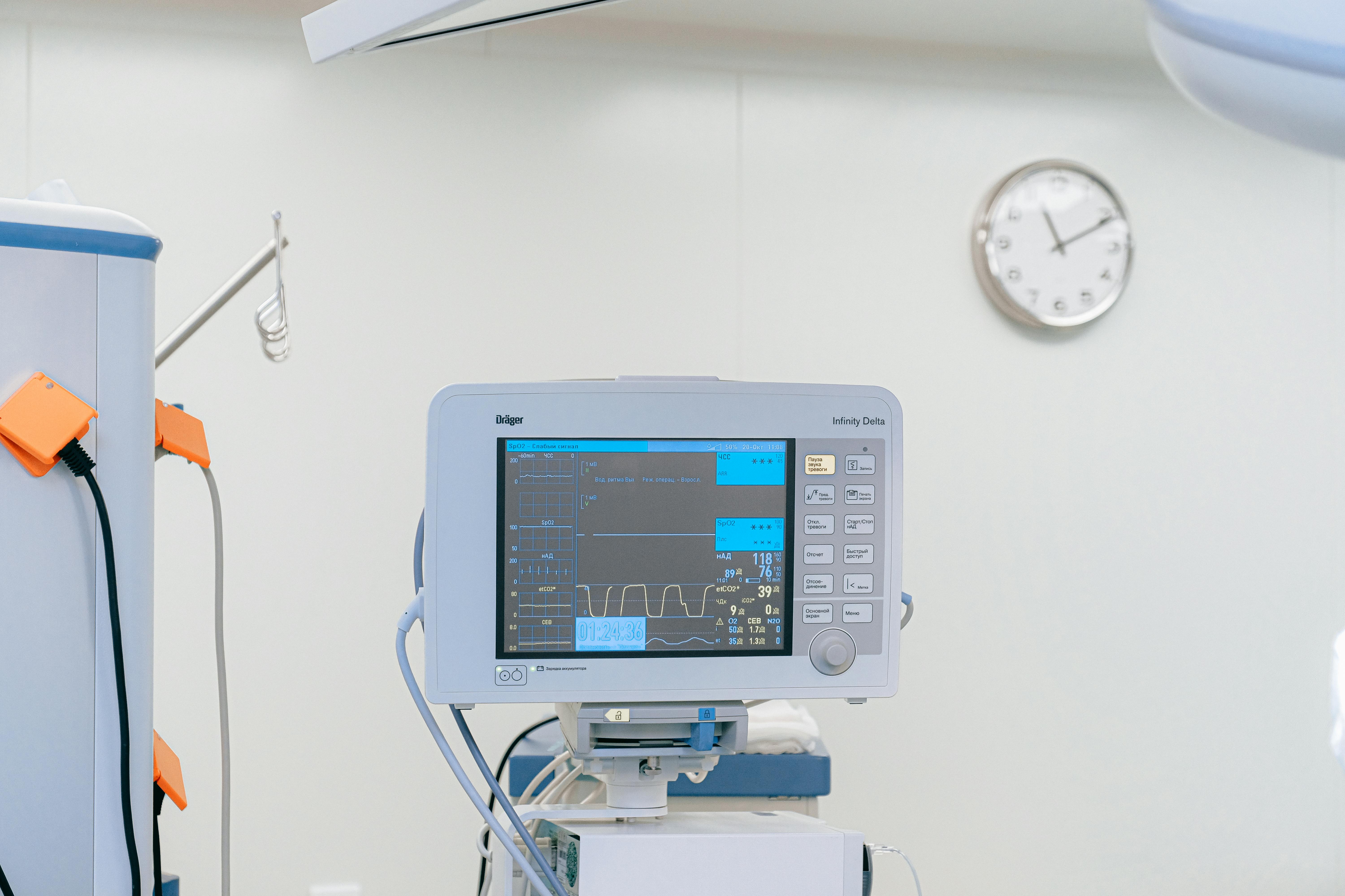 A medical monitor displaying some graphs