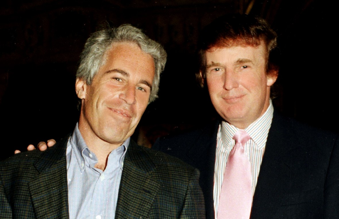 Jeffrey Epstein and Donald Trump pose at the Mar-a-Lago estate.