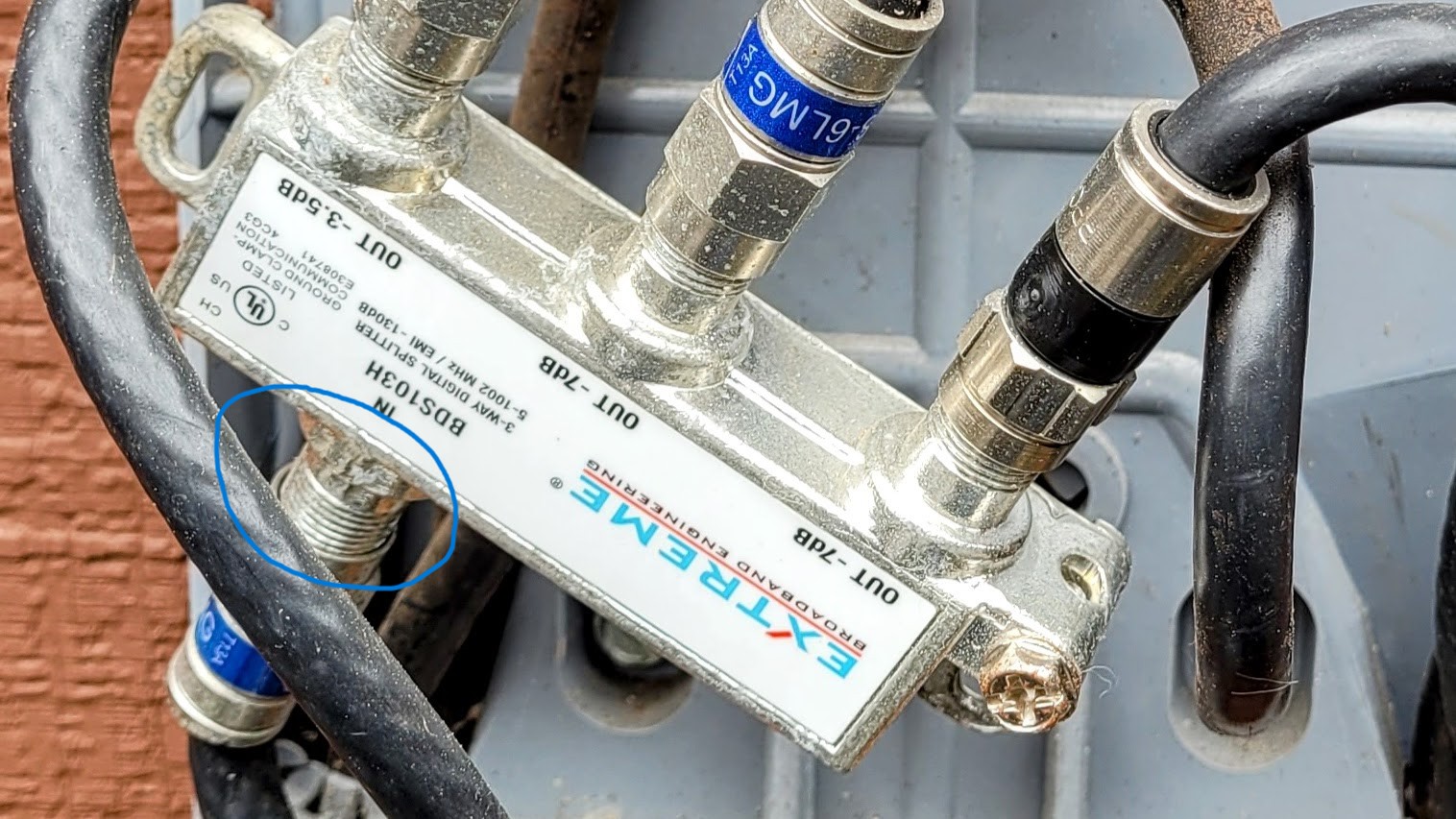 Splitter with loose connection (circled in blue)