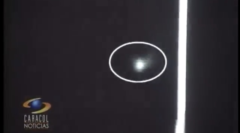 TV news report and news article: Colombian astronomers filmed UFO in 2007
