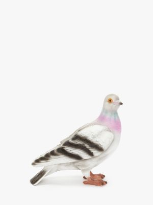 a realistic looking alert pigeon