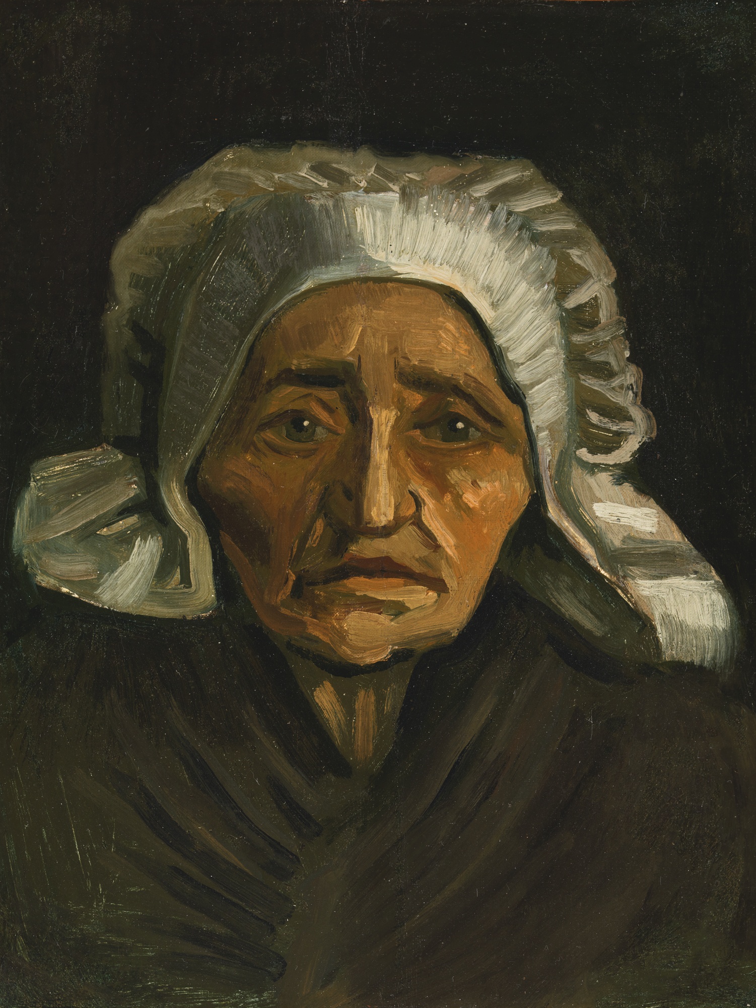 Van Gogh portrait of an older peasant woman wearing a white bonnet