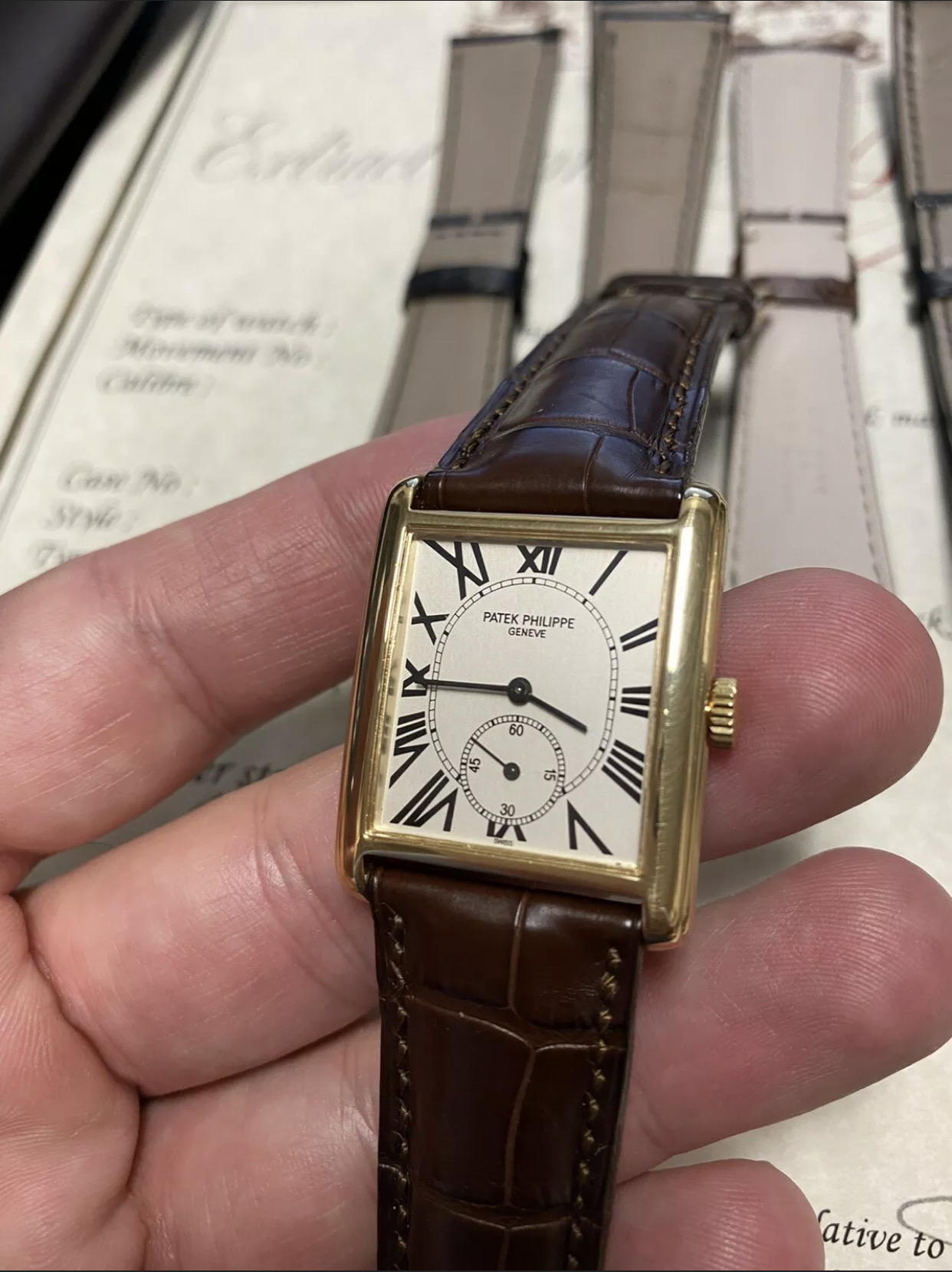 Brian's yellow gold Patek Philippe Gondolo on a brown alligator strap, bought pre-owned on eBay
