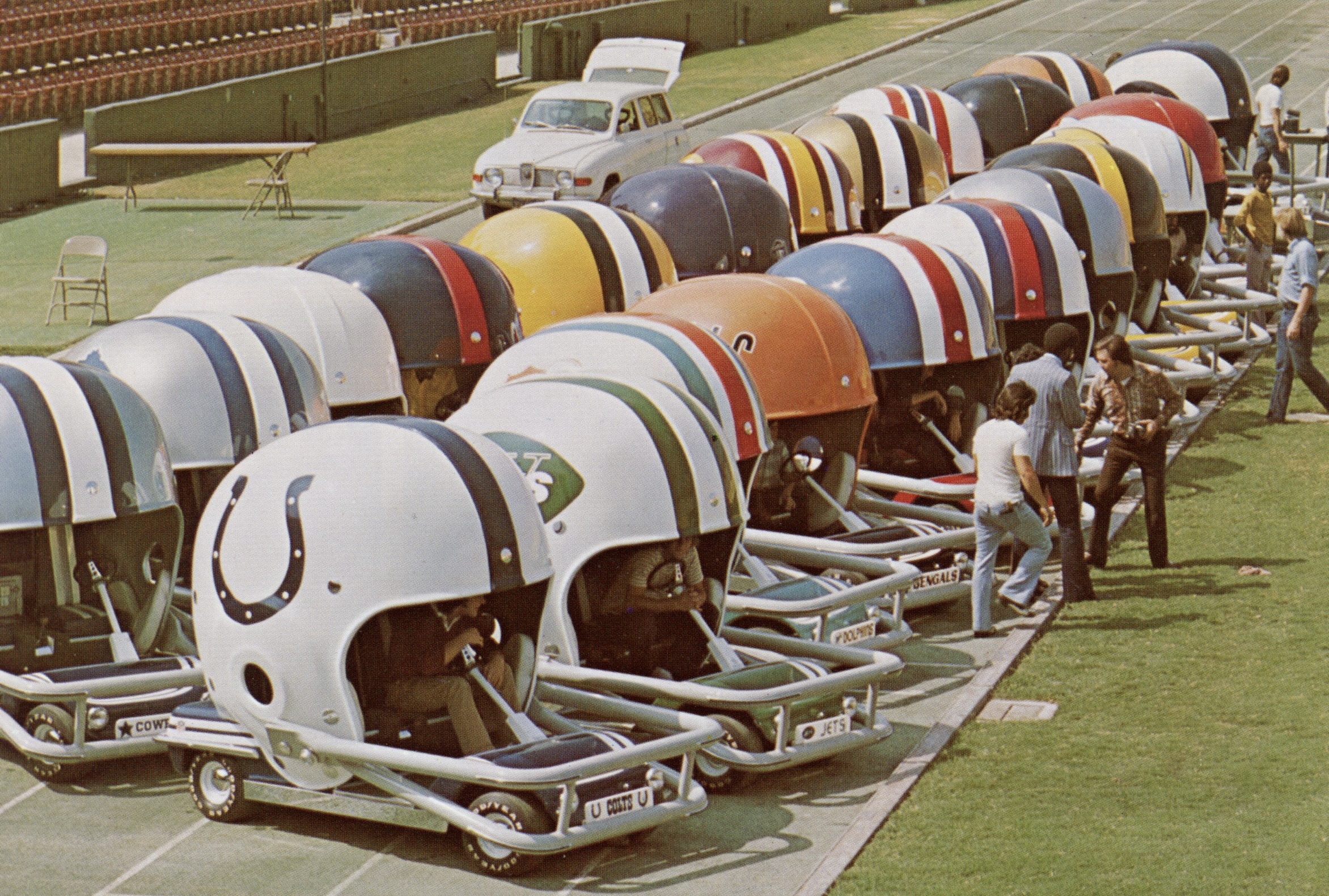 football helmet caet Champion Sports Heavy Duty Steel Cart with Swivel Casters 1973 Detroit Lions Helmet Cart