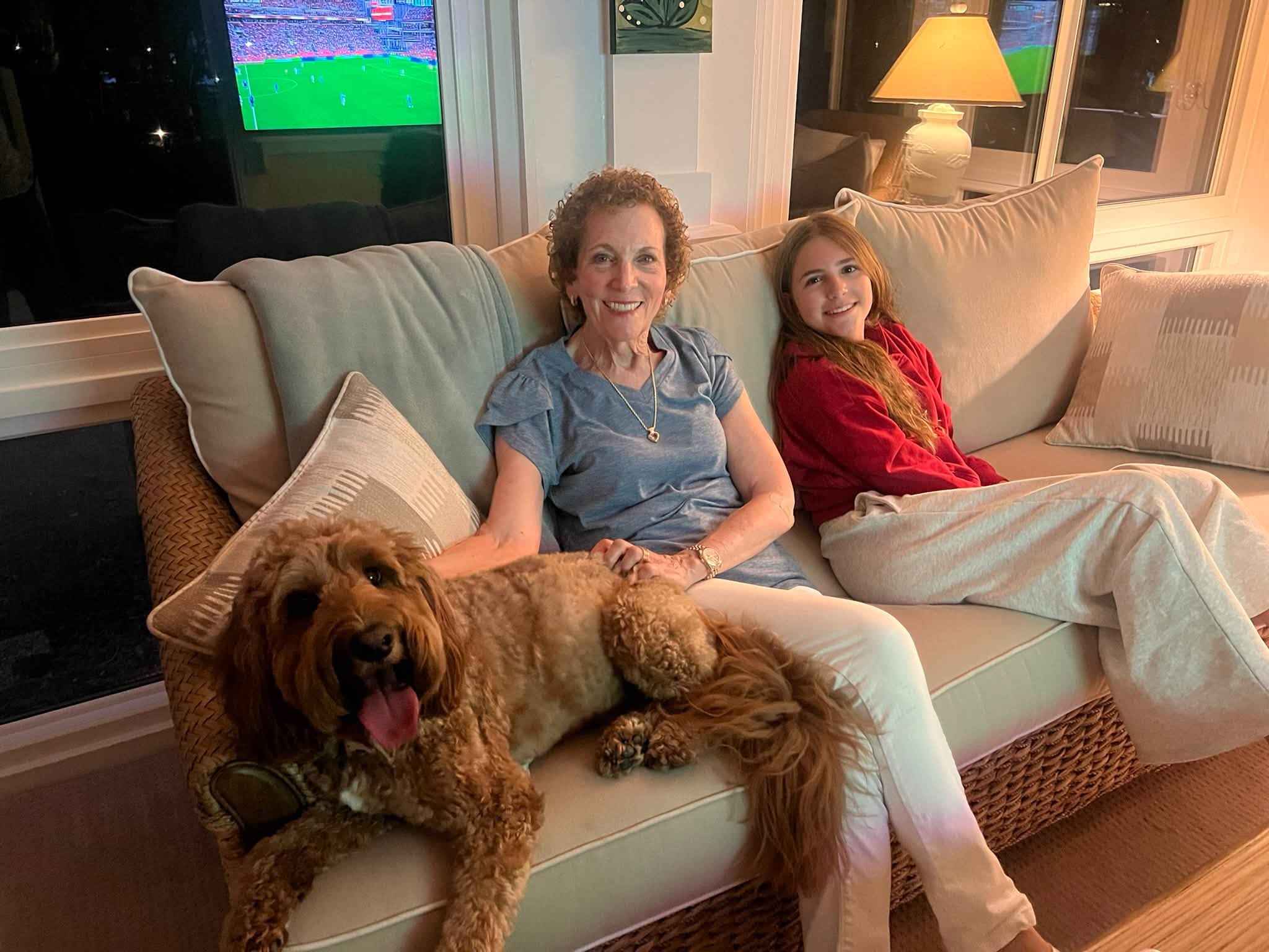 Ricki Spier Cohen and family members with pets