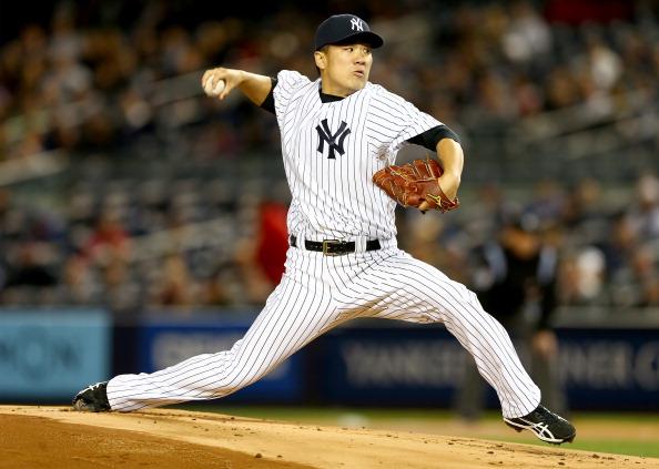 Masahiro Tanaka's absence in the second half may cost the Yankees a post season spot. (Photo by Elsa/Getty Images)