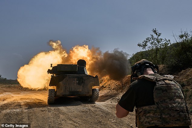 Macron vows to send TROOPS to Ukraine if Putin's forces break through front lines and Zelensky asks for reinforcements - further raising the risk of NATO going head-to-head with Russia