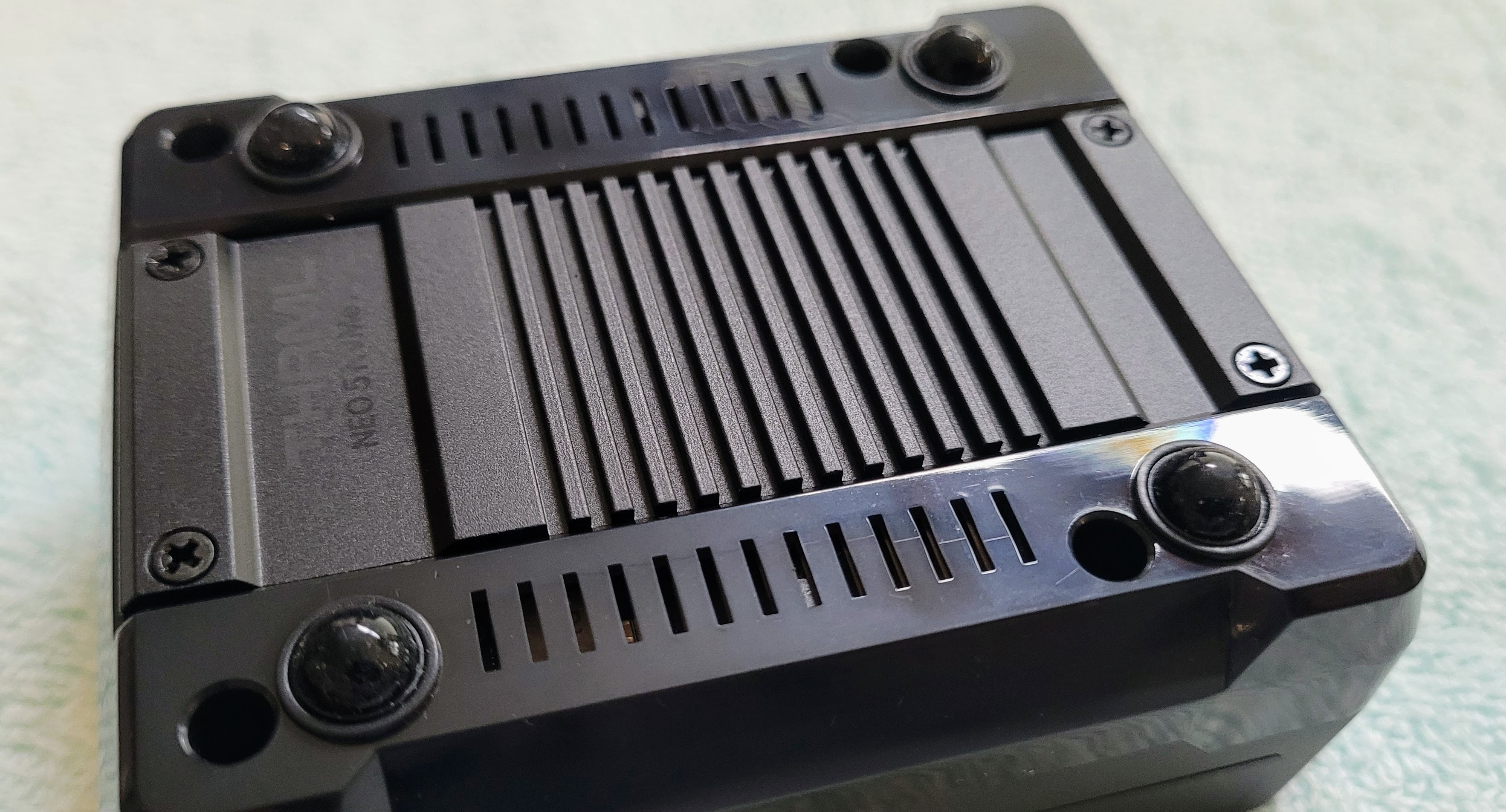 The bottom of the NVMe base: metal where the NVMe drive is, plastic elsewhere