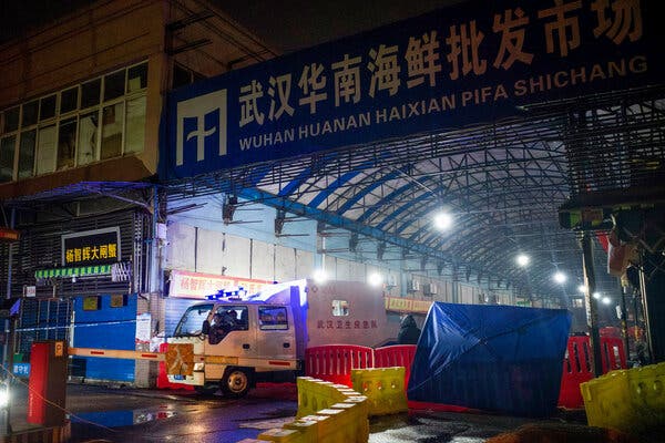 Members of the Wuhan Hygiene Emergency Response Team leaving the closed Huanan Seafood Wholesale Market on Jan. 11, 2020. Members of the Wuhan Hygiene Emergency Response Team leaving the closed Huanan Seafood Wholesale Market on Jan. 11, 2020.