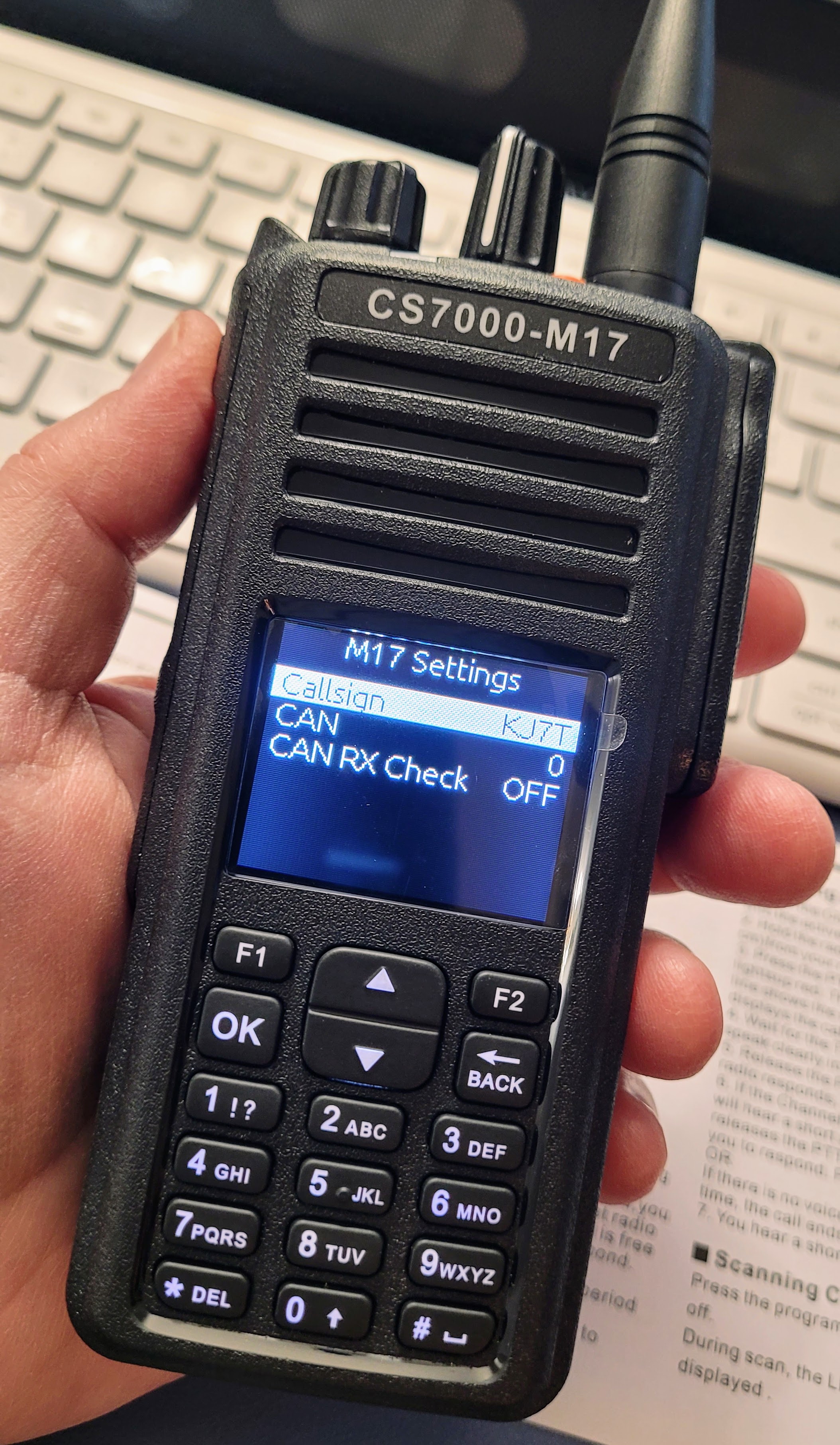 CS7000-M17 radio in hand