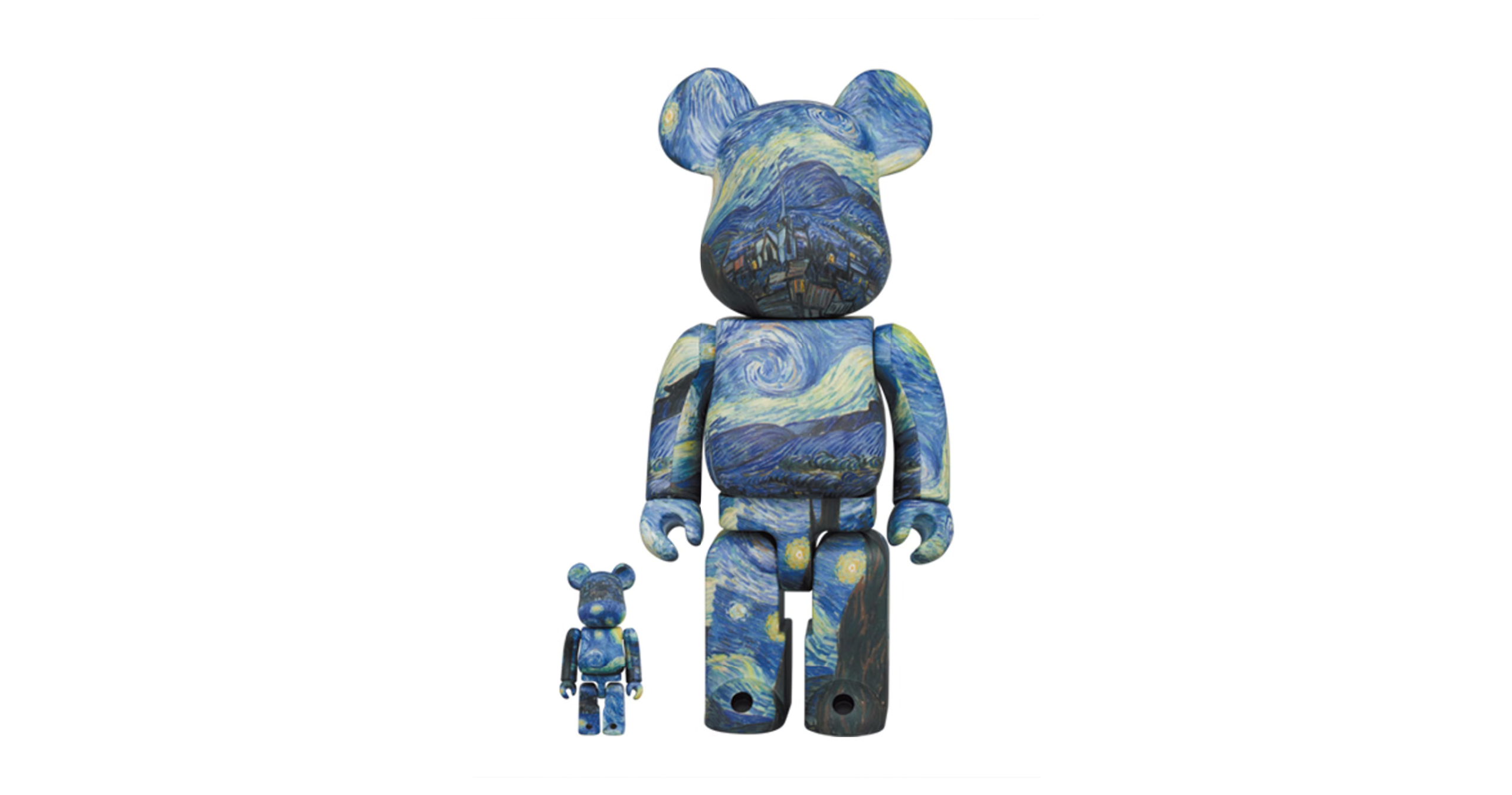 Two bear-shaped collectible figures decorated with a Starry Night pattern