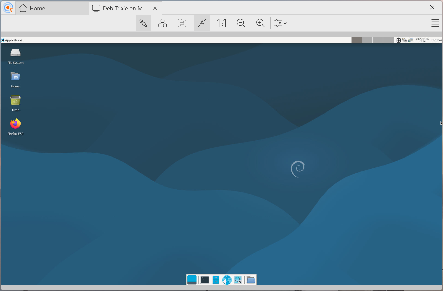 Screenshot of Debian 13 “Trixie” on a Mac Mini over VNC
