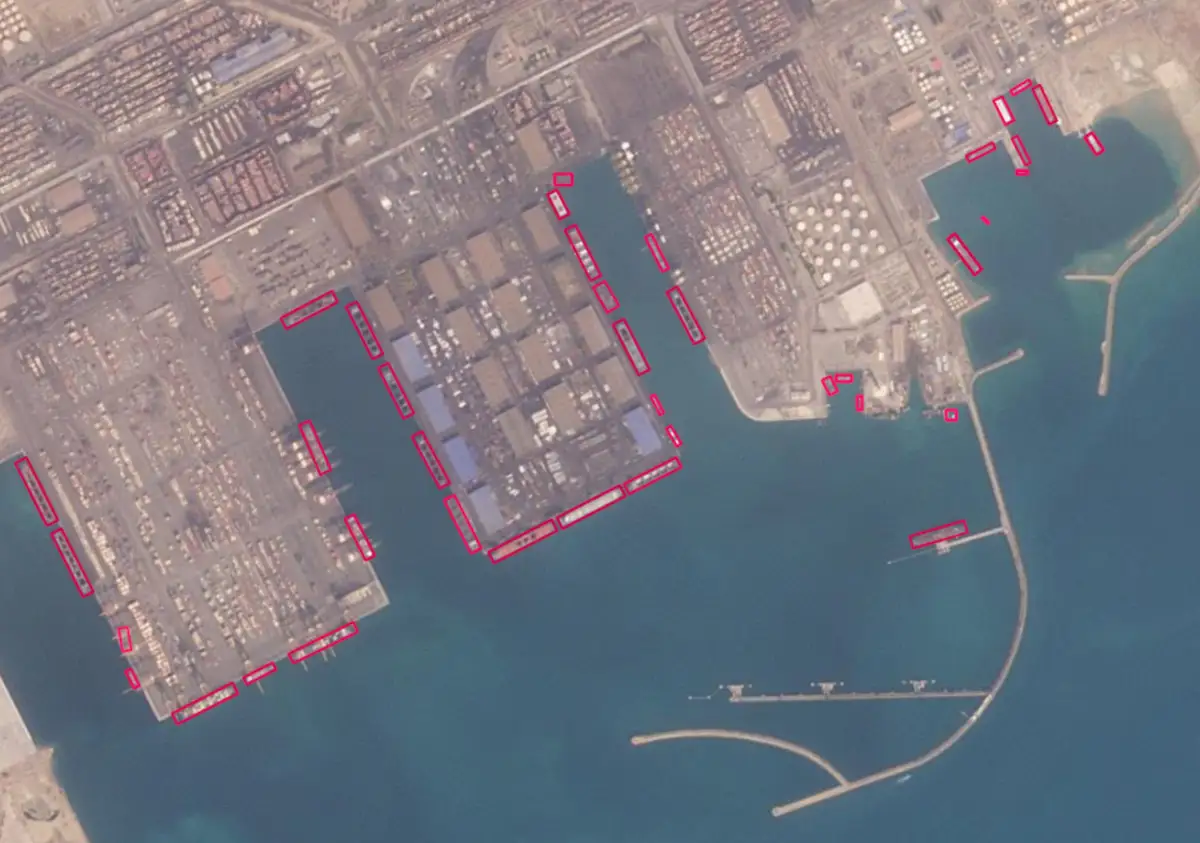 The automated Planet Analytics interface demonstrating deep-learning computer vision for real-time vessel detection.