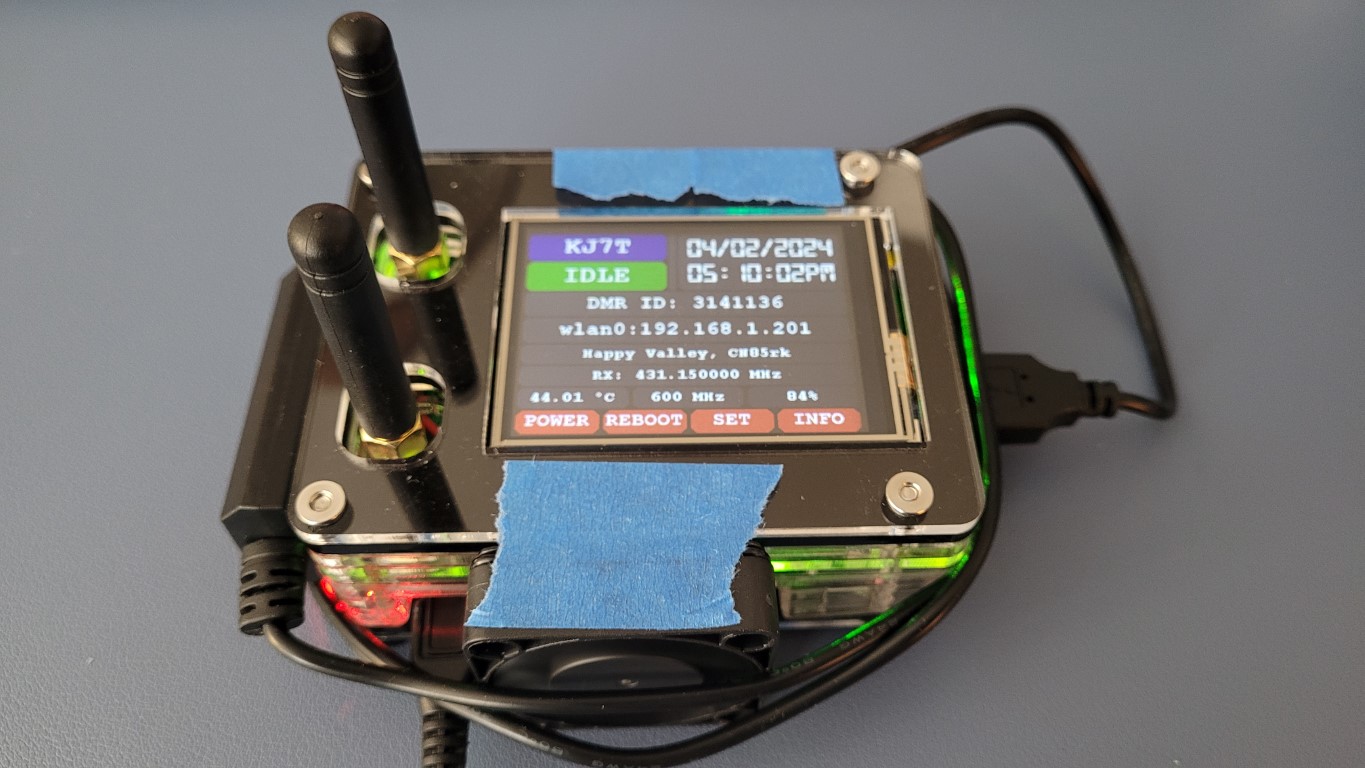 Hotspot with USB fan temporarily taped to the case