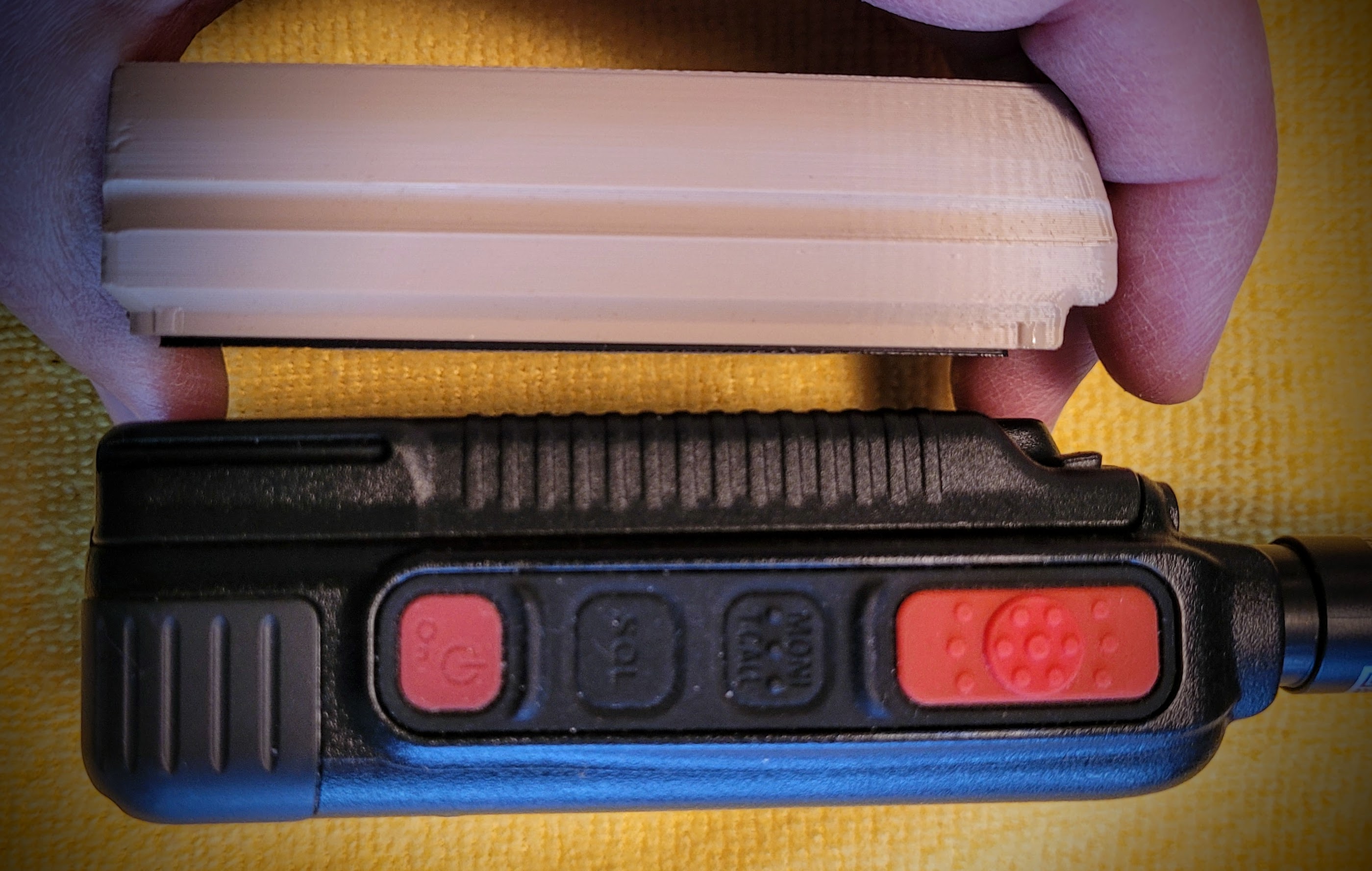 W0AEZ battery thickness compared to the stock battery