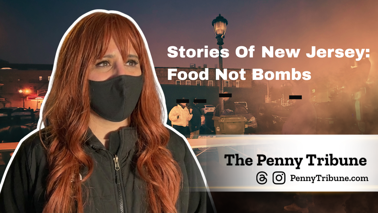 A woman with long reddish hair wearing a black face mask, standing in front of a dimly lit street scene, with people and trash cans in the background. The image promotes a story about 'Food Not Bombs' in New Jersey.