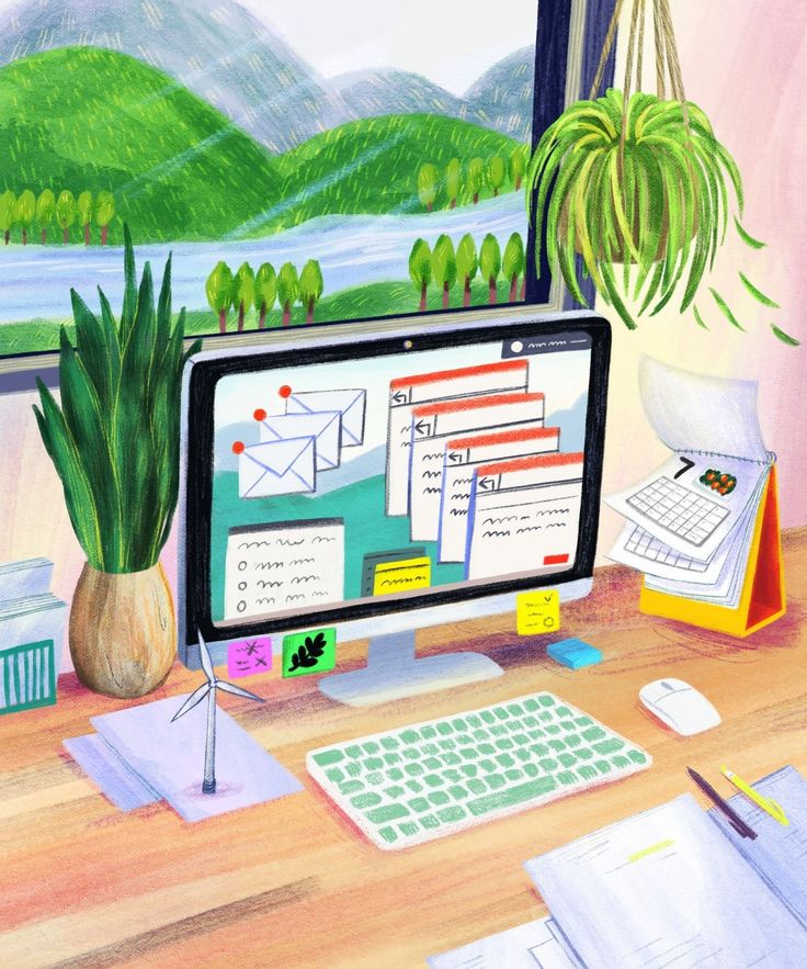 This may contain: a computer monitor sitting on top of a wooden desk