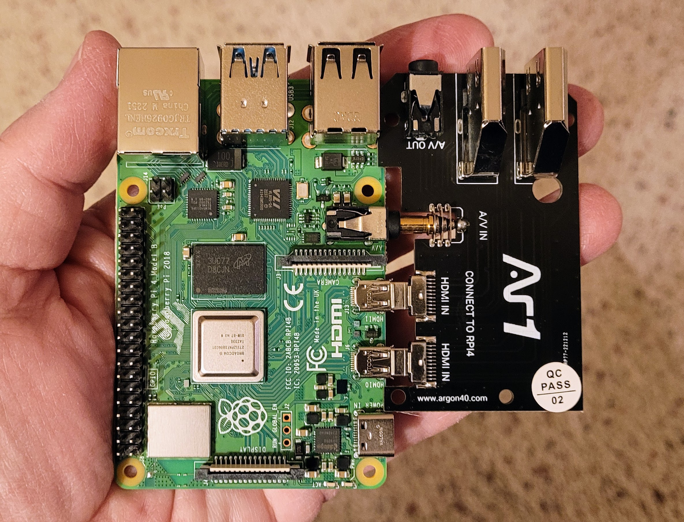 The RPi 4 and the HDMI converter mated in three places: the two microHDMI ports and the TRRS port