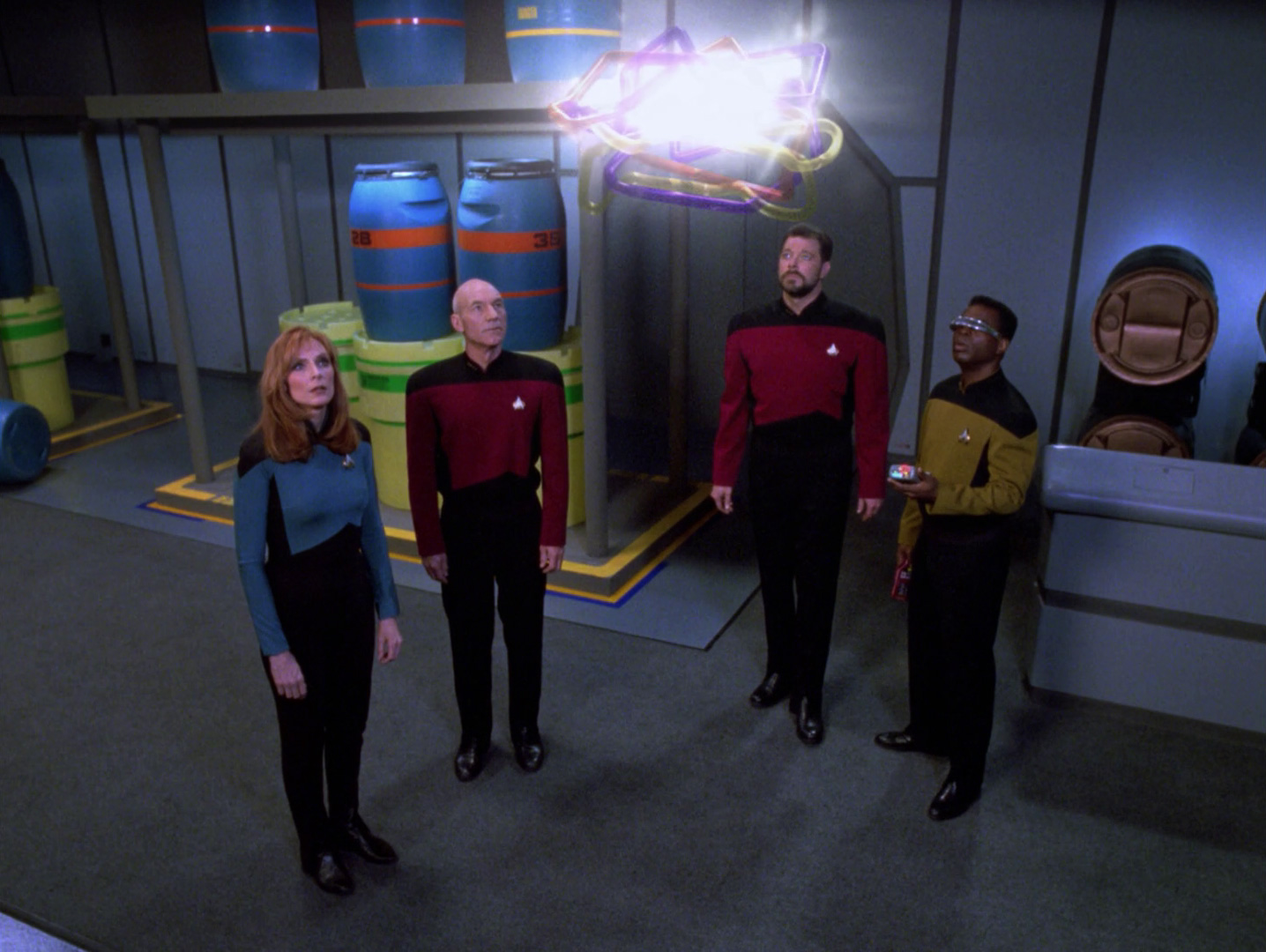 Crusher, Picard, Riker, and Geordi staring at the Enterprise's unusual creation.