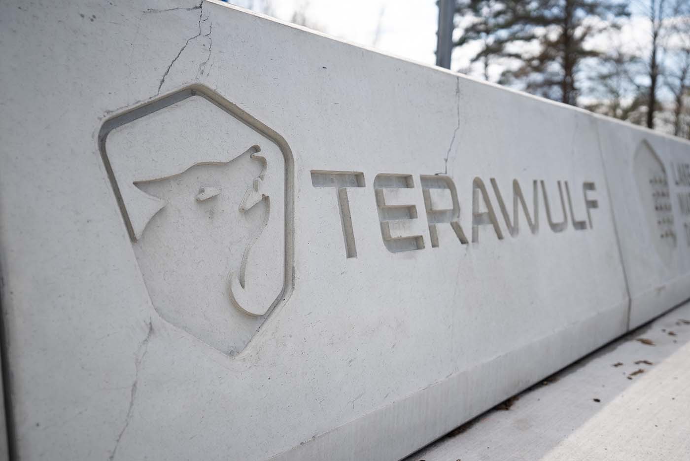 TeraWulf logo on a barrier at the Lake Mariner campus