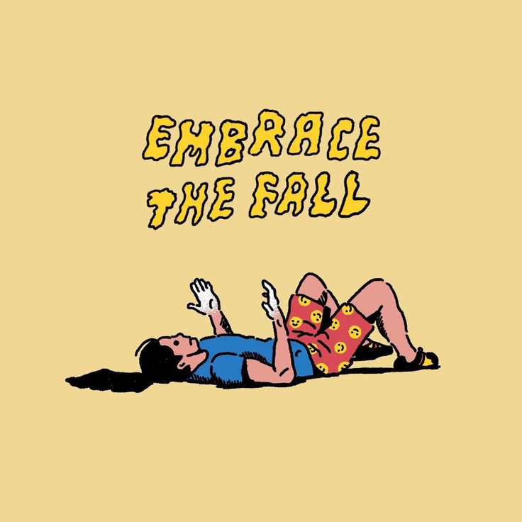 This may contain: an image of a man laying on the ground with his hand up in front of him