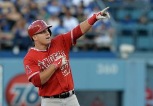Aug 4, 2014; Los Angeles, CA, USA; Los Angeles Angels center fielder Mike Trout (27) reacts on second base after he doubled in a run in the first inning of the game Los Angeles Dodgers at Dodger Stadium. Mandatory Credit: Jayne Kamin-Oncea-USA TODAY Sports