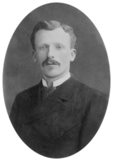 Black-and-white photographic portrait of Theo van Gogh in a dark suit