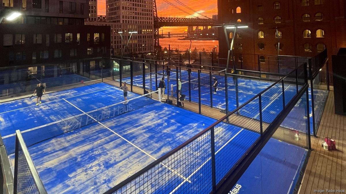 Rooftop padel court at sunset at Padel Haus Williamsburg
