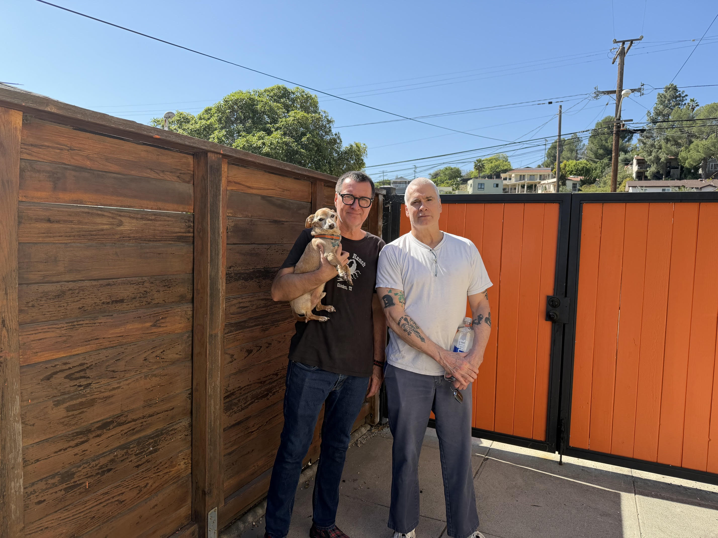 Larry Hardy (and his dog) with Henry Rollins. Photo by Robyn Ginsburg.
