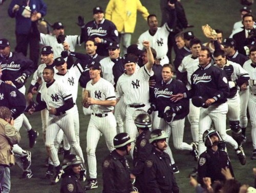 NEW YORK, UNITED STATES: The New York Yankees celebrate 26 October after beating the Atlanta Braves in game six 3-2 to win the World Series at Yankee Stadium in New York. (ELECTRONIC IMAGE) AFP PHOTO/Timothy CLARY (Photo credit should read TIMOTHY A. CLARY/AFP/Getty Images)