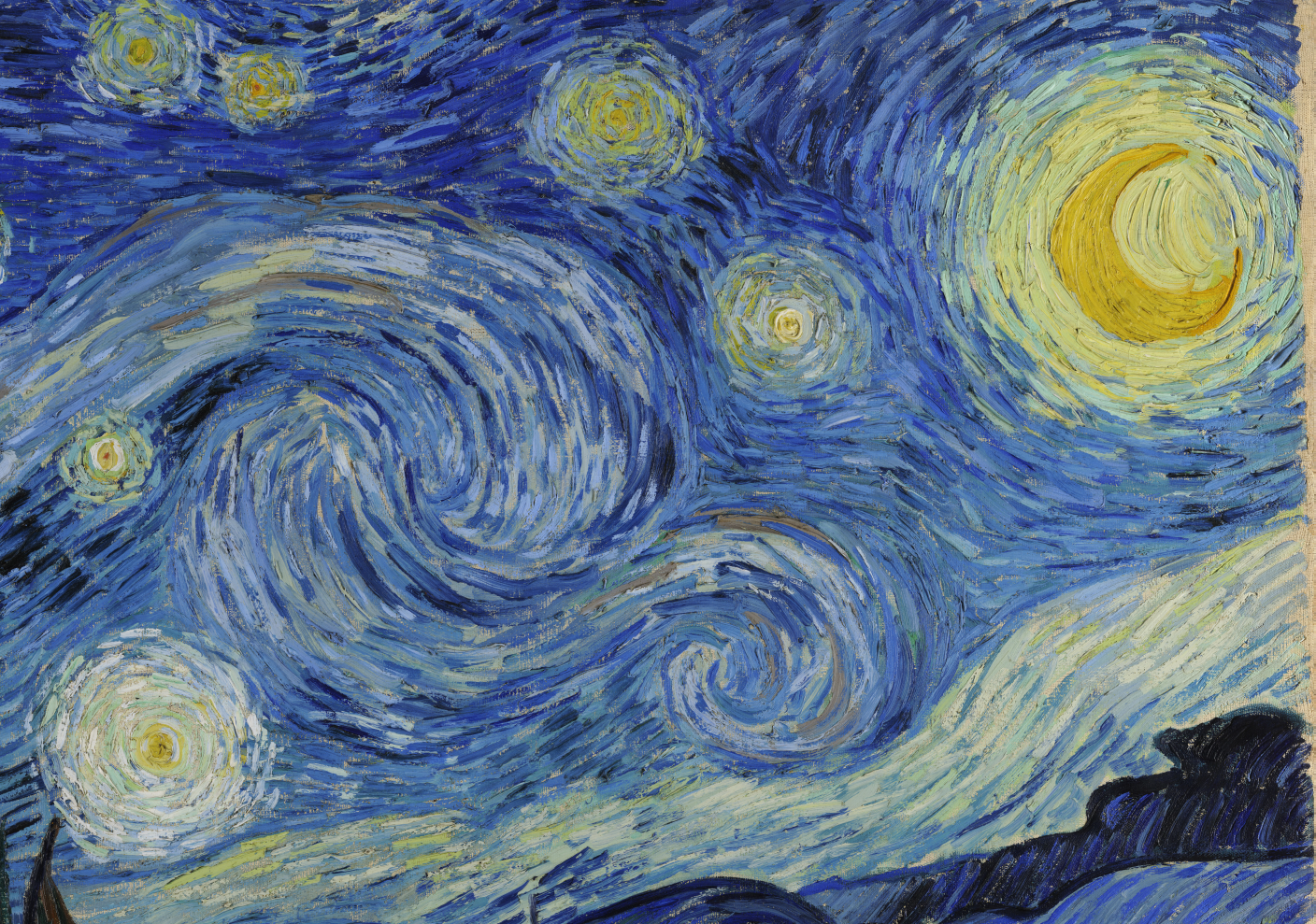 Close-up of the swirling blue sky and bright stars in The Starry Night
