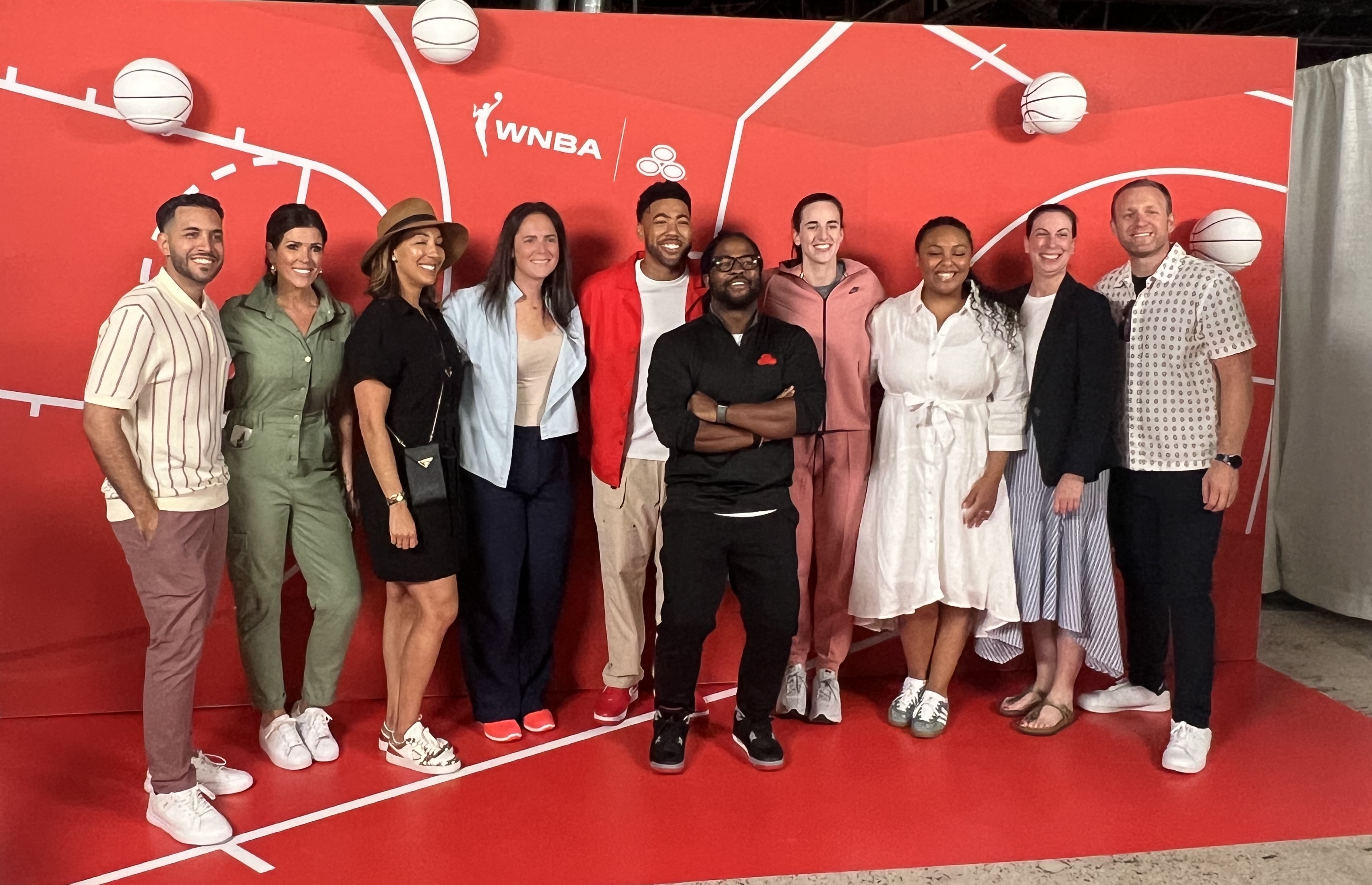 Caitlin Clark surprises fans at State Farm pop-up, photobombs with Jake