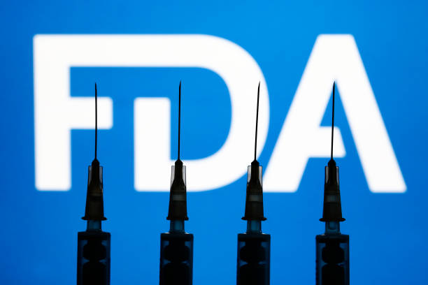 Medical syringes and FDA logo displayed in the background are seen in this illustration photo taken in Krakow, Poland on December 2, 2021. (Photo by Jakub Porzycki/NurPhoto via Getty Images) Medical syringes and FDA logo displayed in the background are seen in this illustration photo taken in Krakow, Poland on December 2, 2021. (Photo by Jakub Porzycki/NurPhoto via Getty Images)