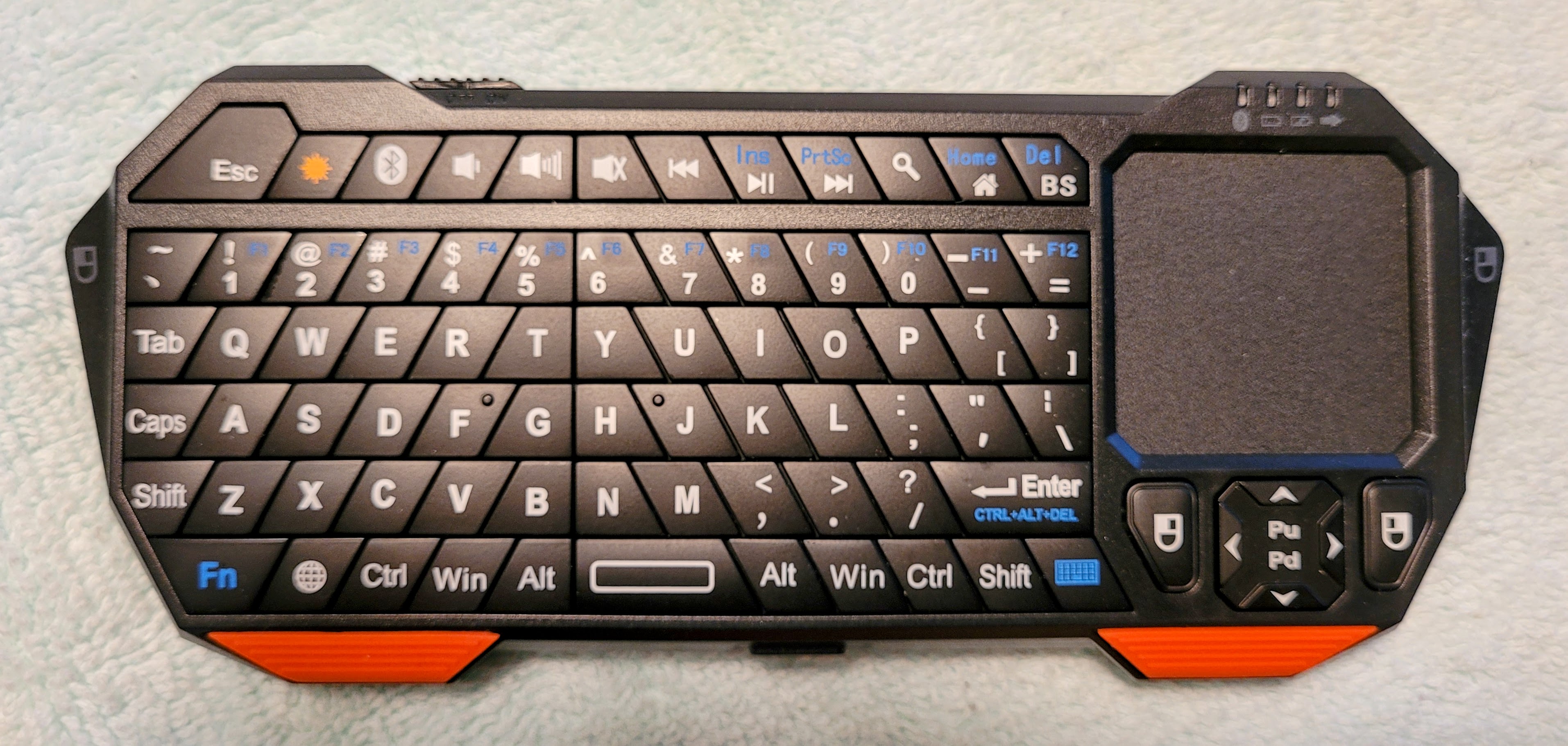 Fosmon miniature Bluetooth keyboard with mouse pad
